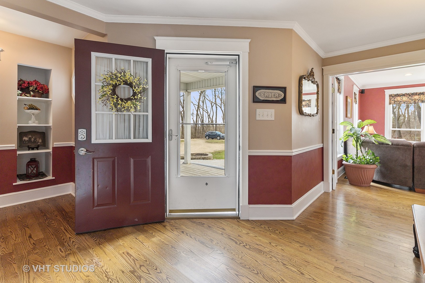 5509 Pagles Road Harvard, IL 60033 - Photo 3 of 26 a view of livingroom with furniture wooden floor and windows
