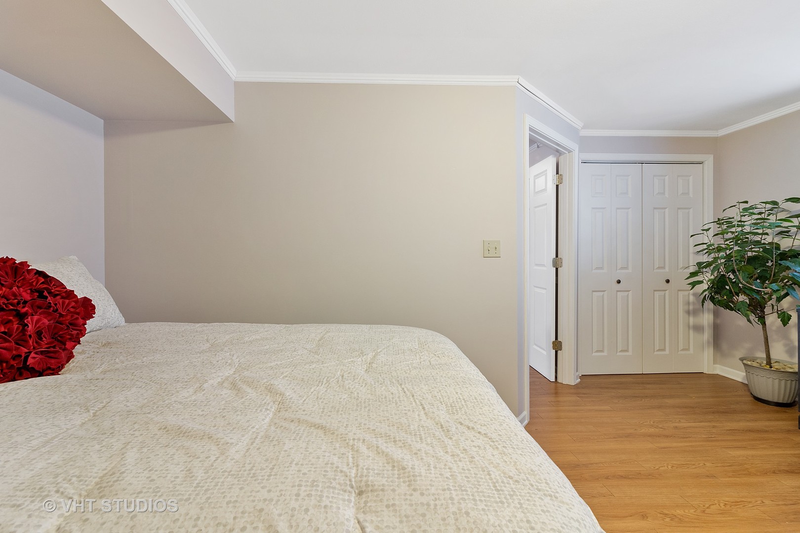 5509 Pagles Road Harvard, IL 60033 - Photo 22 of 26 a bedroom with a bed and a potted plant