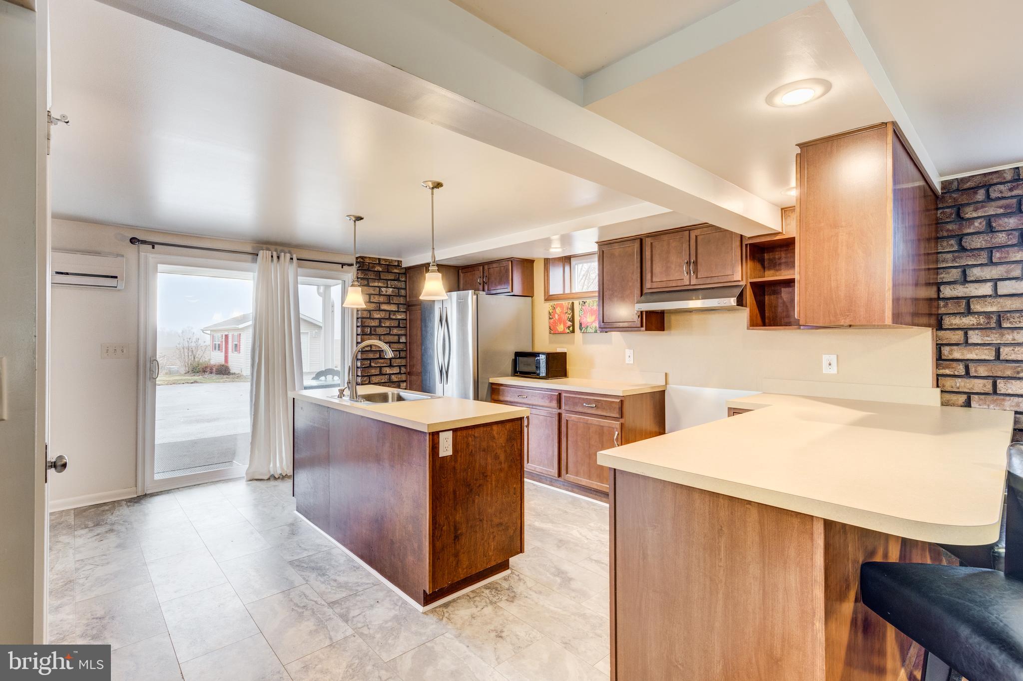 2303 Coon Club Road Westminster, MD 21157 - Photo 29 of 62 Lower level w/sliders to covered patio & parking
