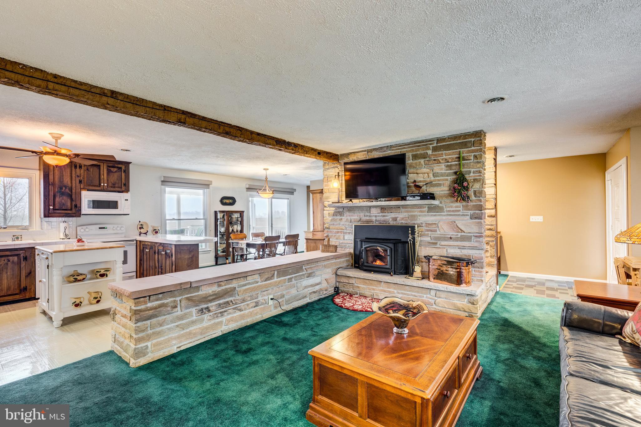 2303 Coon Club Road Westminster, MD 21157 - Photo 5 of 62 Center beam, stone knee-wall & raised hearth FP