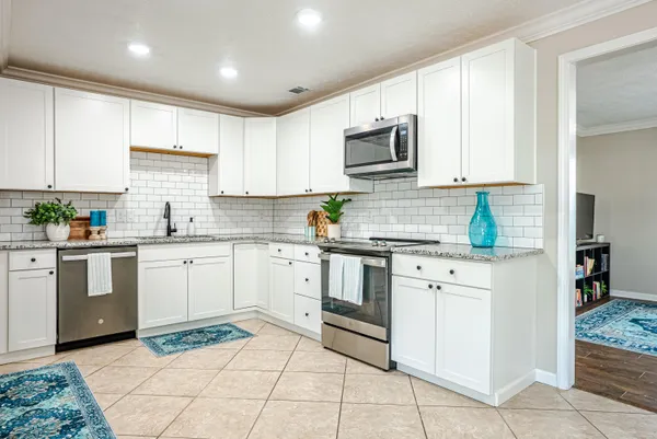 a view of a dining room kitchen and a window
