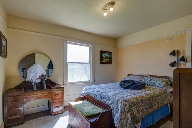 a view of a big yard with an trees