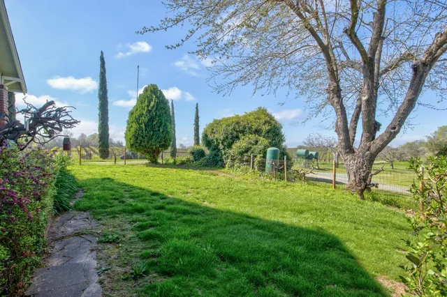 a house view with garden space
