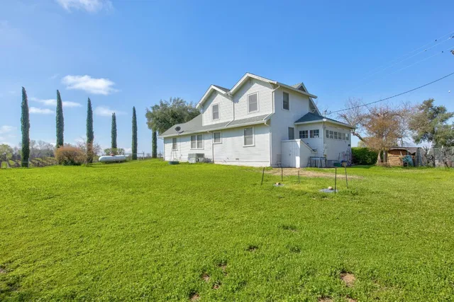 a view of a town with mountains in the background