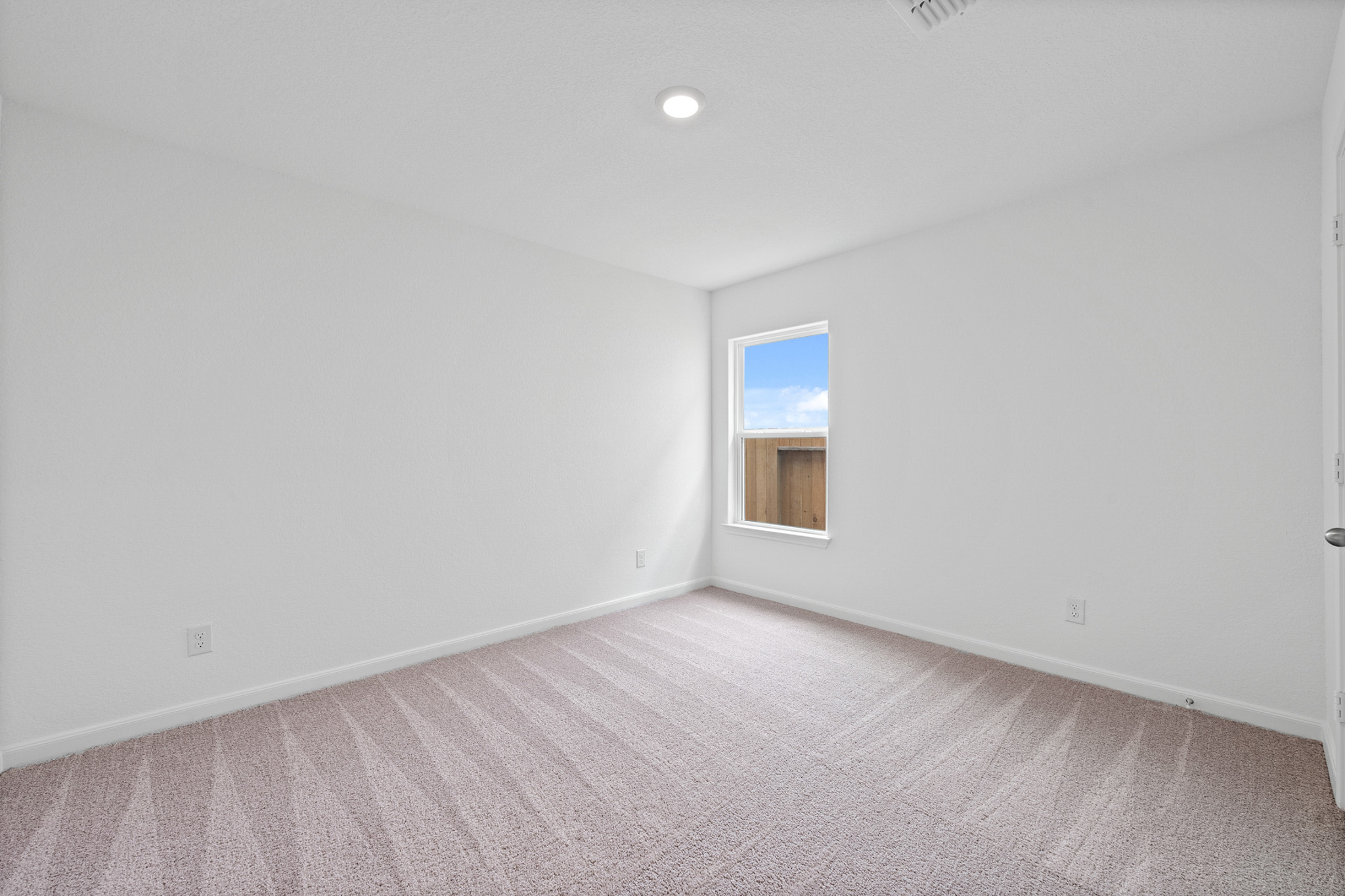 402 Aplite Pass Maxwell, TX 78656 - Photo 5 of 6 a view of an empty room with a window