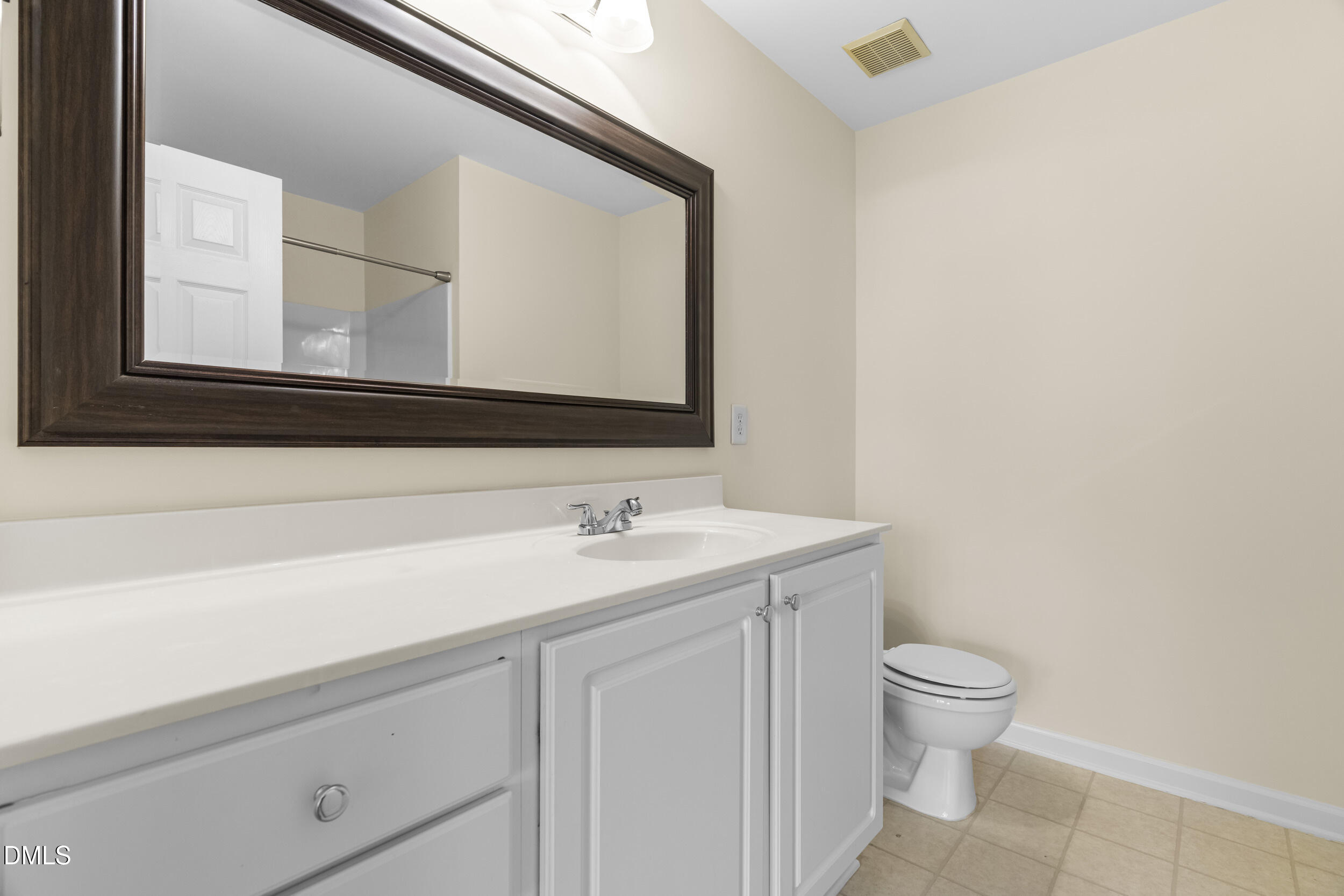 8246 City Loft Court Raleigh, NC 27613 - Photo 24 of 33 Primary bedroom