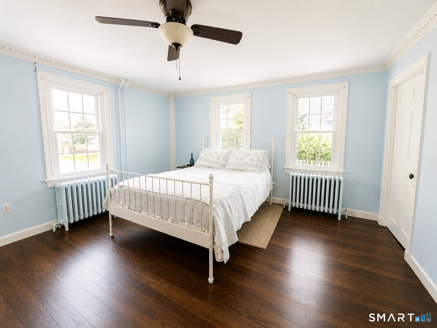 443 Amity Road Bethany, CT 06524 - Photo 20 of 30 a bed sitting in a bedroom next to a window