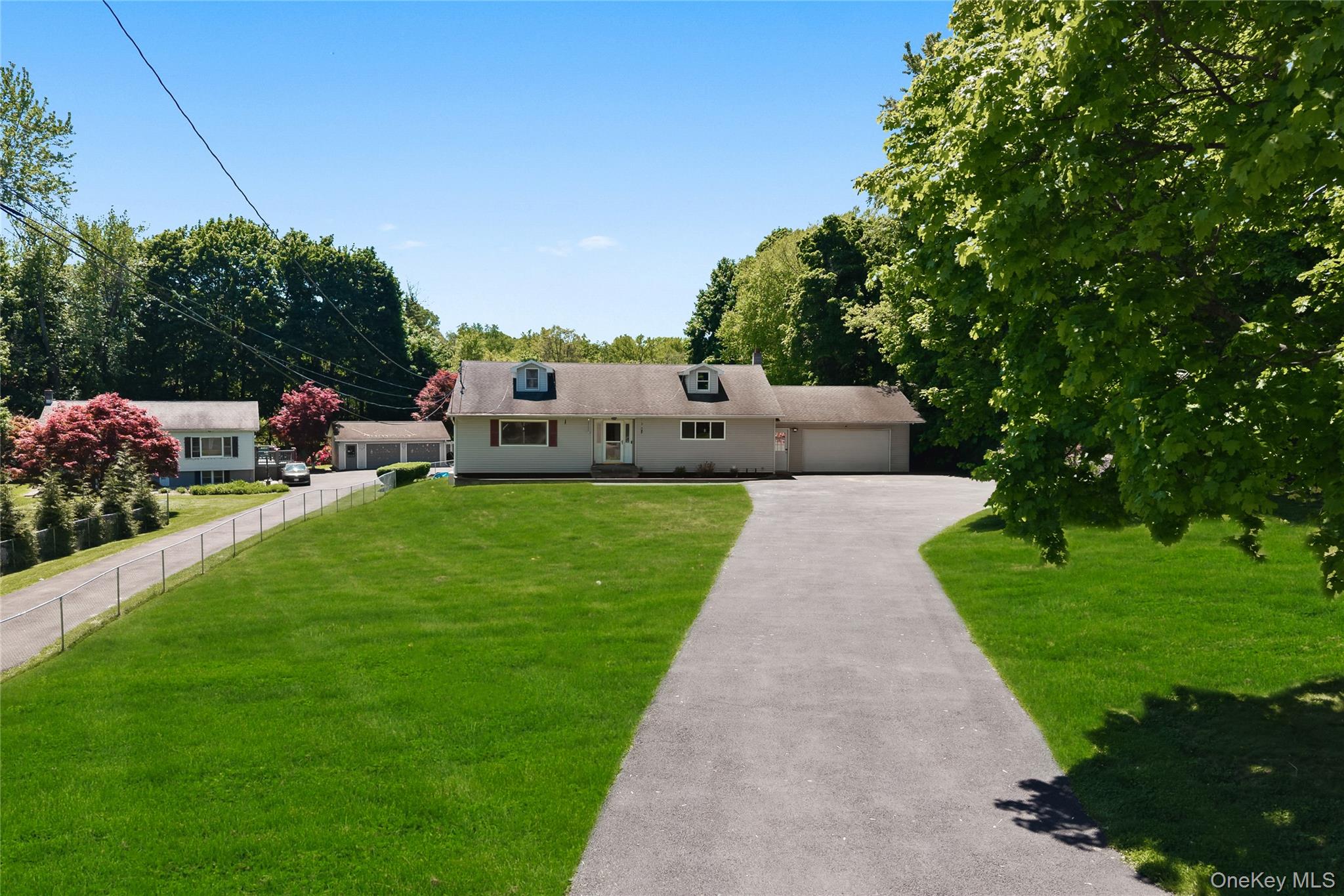 69 Silver Spring Road New Windsor, NY 12553 - Photo 2 of 20 a view of a backyard with sitting area