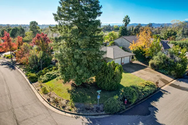 an aerial view of a house with a outdoor space