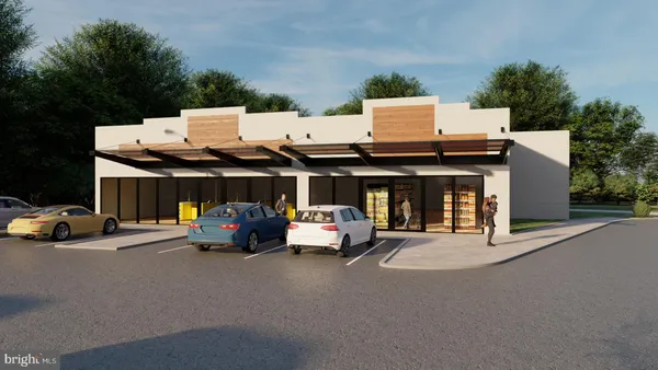 a view of a car park in front of house