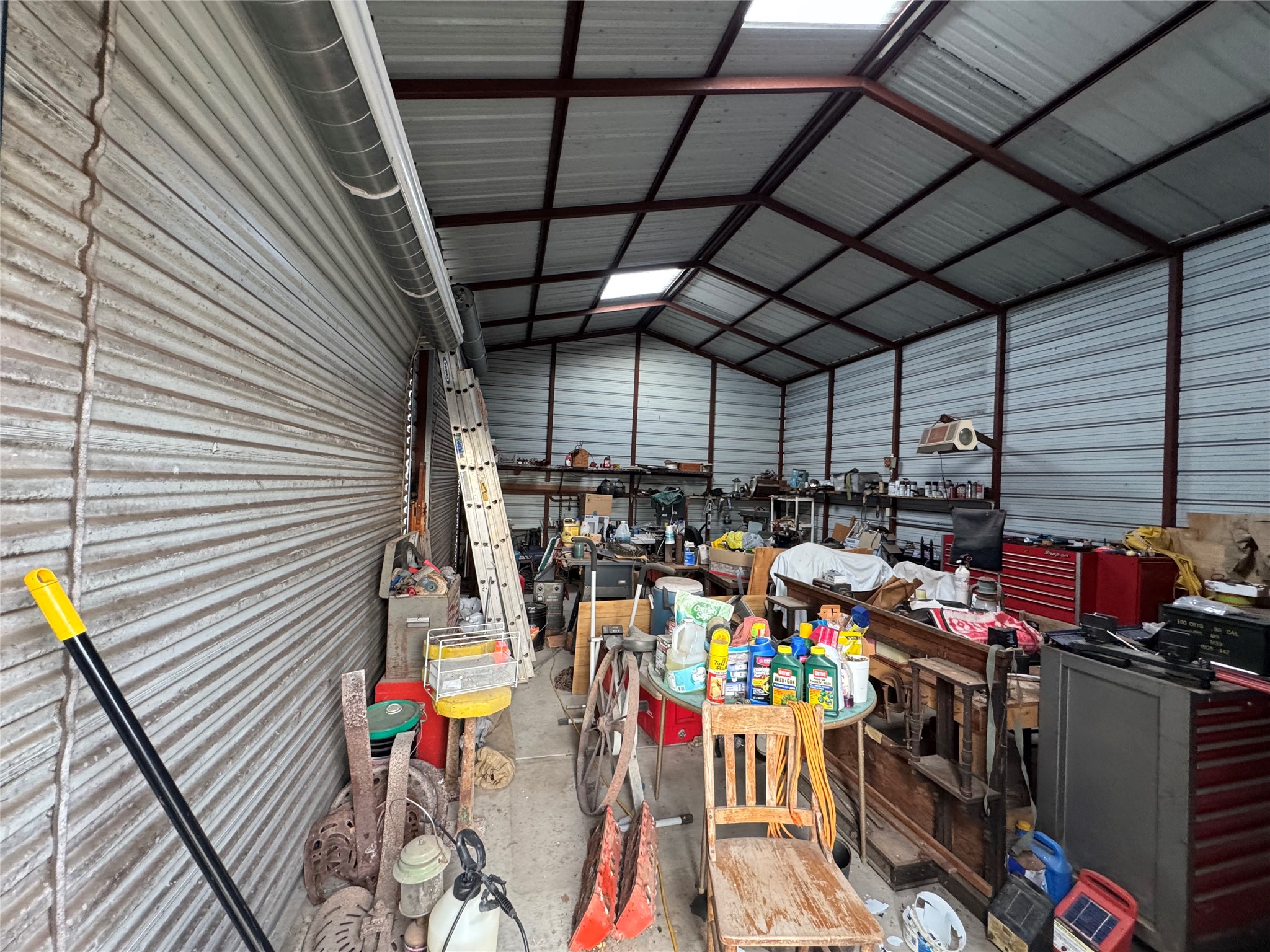 14831 Bois-D-Arc Road, Unit 10 Manor, TX 78653 - Photo 6 of 17 Inside of workshop