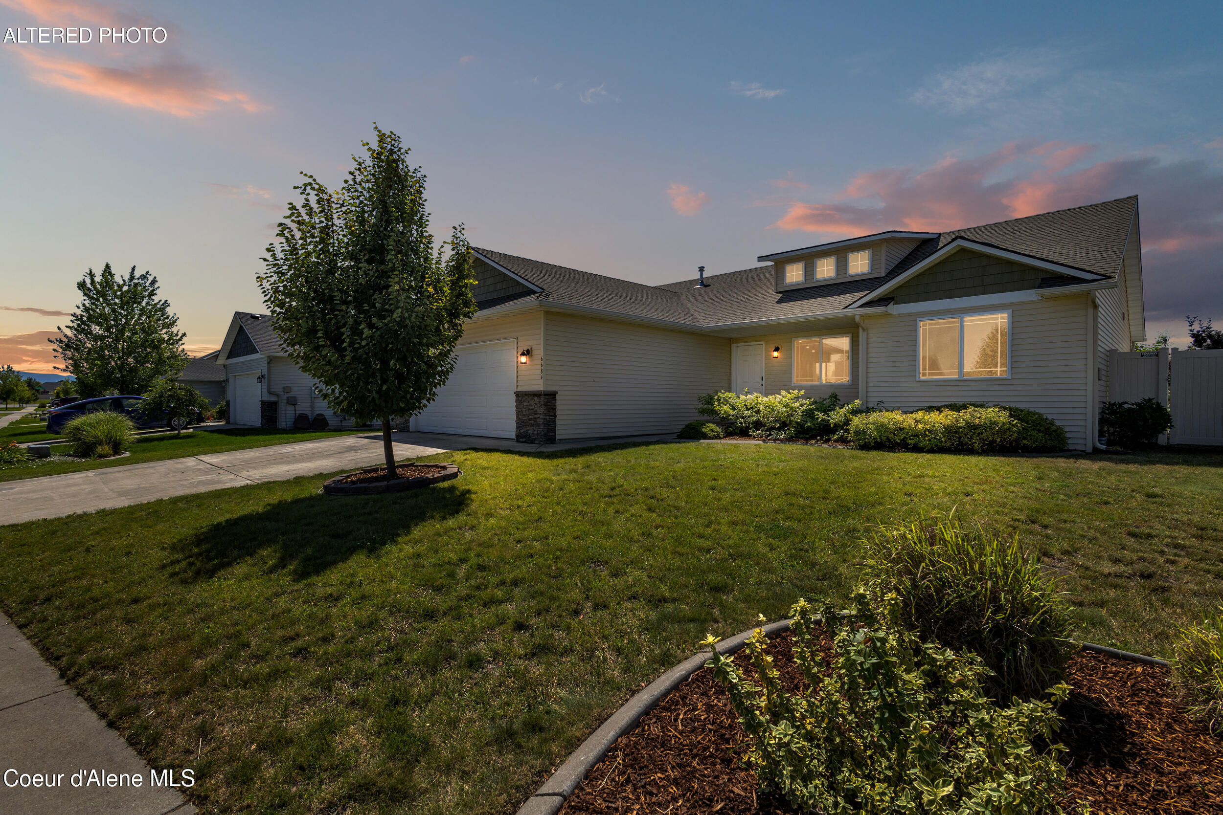 6684 West Conner Street Rathdrum, ID 83858 - Photo 3 of 42 FRONT OF HOUSE SUNSET
