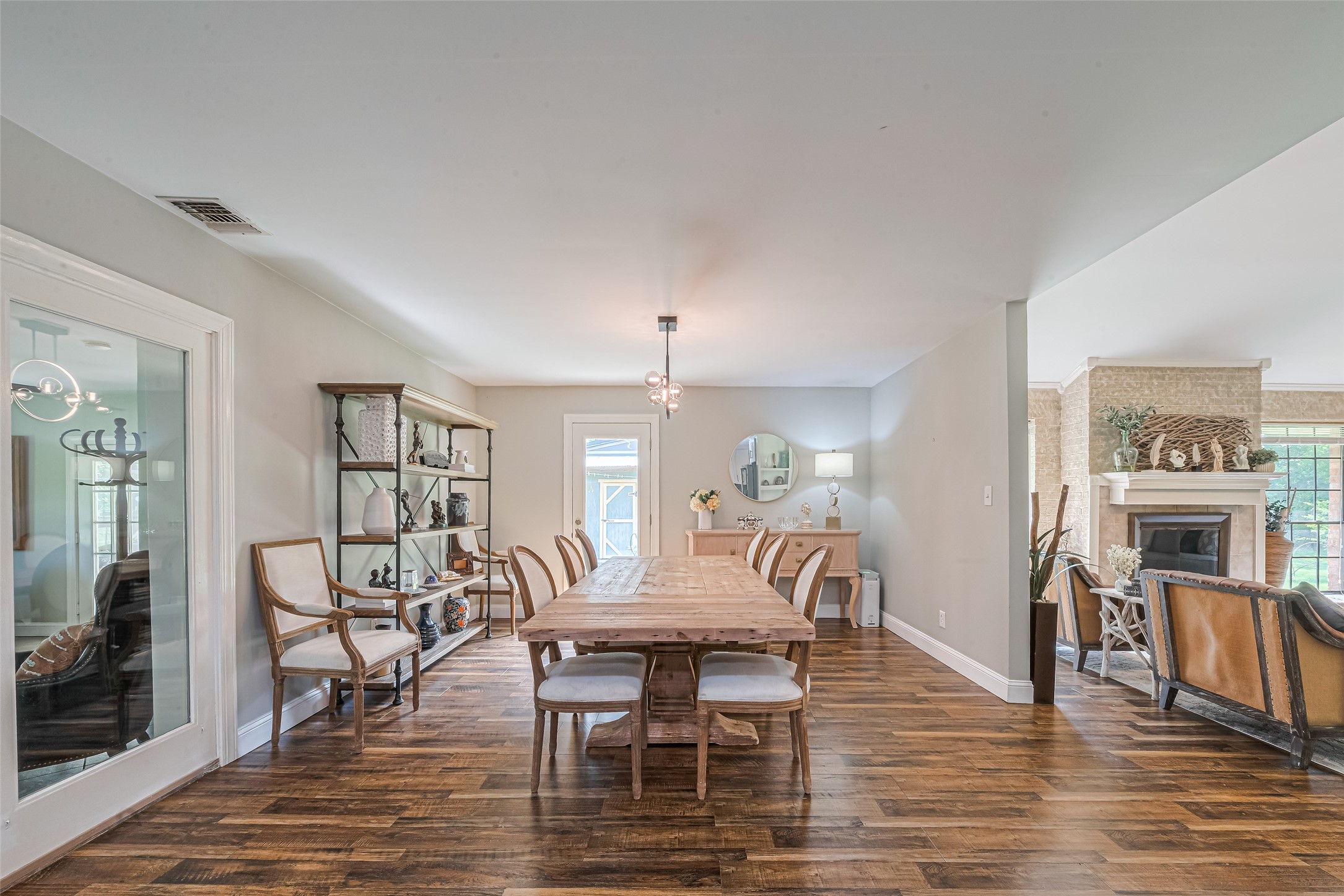 24314 Anderson Street Huffman, TX 77336 - Photo 18 of 48 a view of a a dining room with furniture window and wooden floor