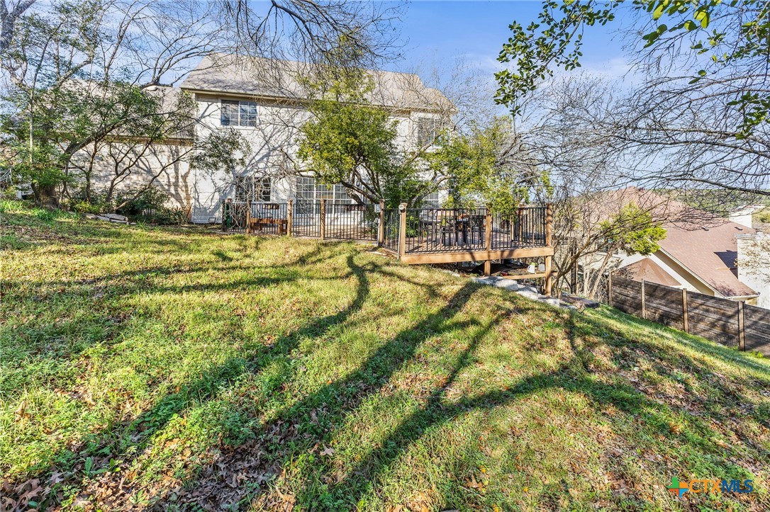 5901 Round Table Cove Austin, TX 78746 - Photo 46 of 46 a view of swimming pool with a yard and plants