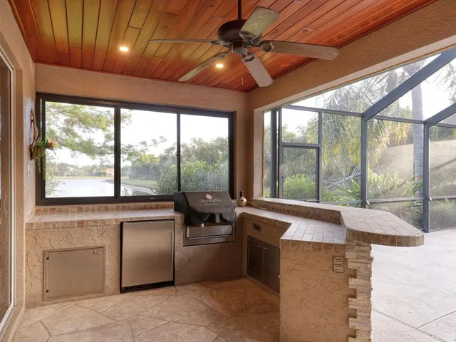 a view of a kitchen with a sink and a bath tub