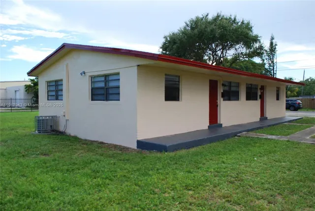 a front view of house with yard