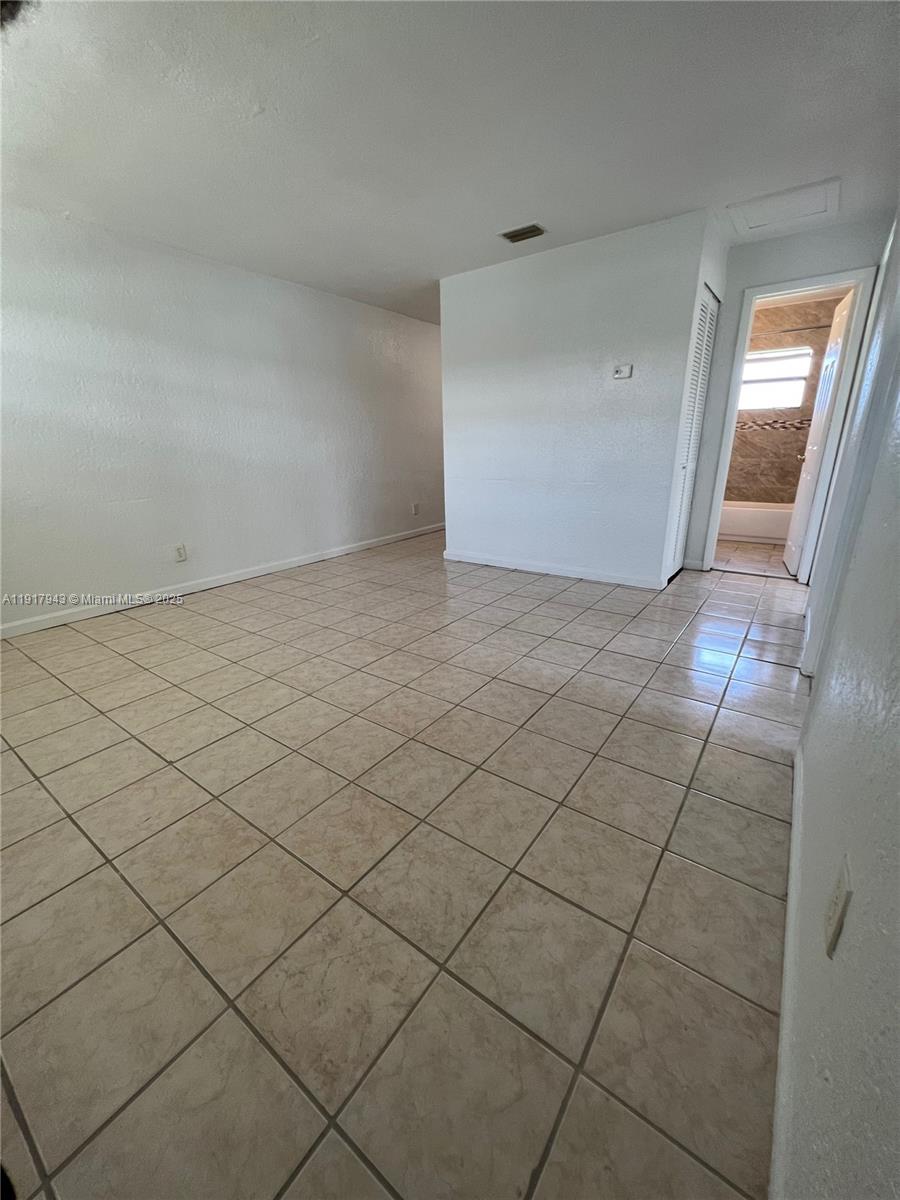 300 Northwest 5th Terrace, Unit 1 Hallandale Beach, FL 33009 - Photo 3 of 13 a view of empty room