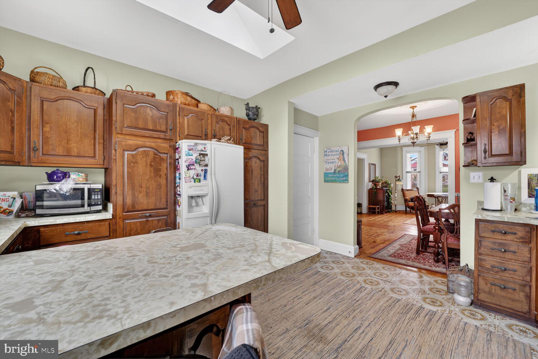 4808 Riverdale Road Riverdale, MD 20737 - Photo 9 of 45 Kitchen w access to lower lvl and pool