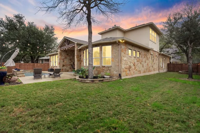 a view of a swimming pool with a lounge chairs