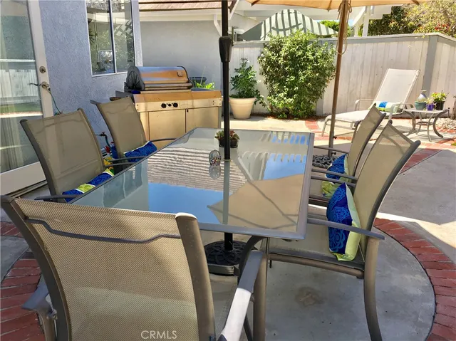 a view of a house with a balcony and garage