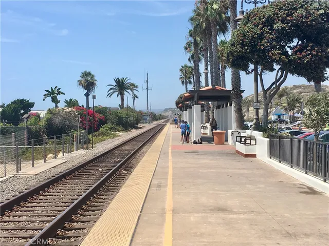 an aerial view of a house with a lake view