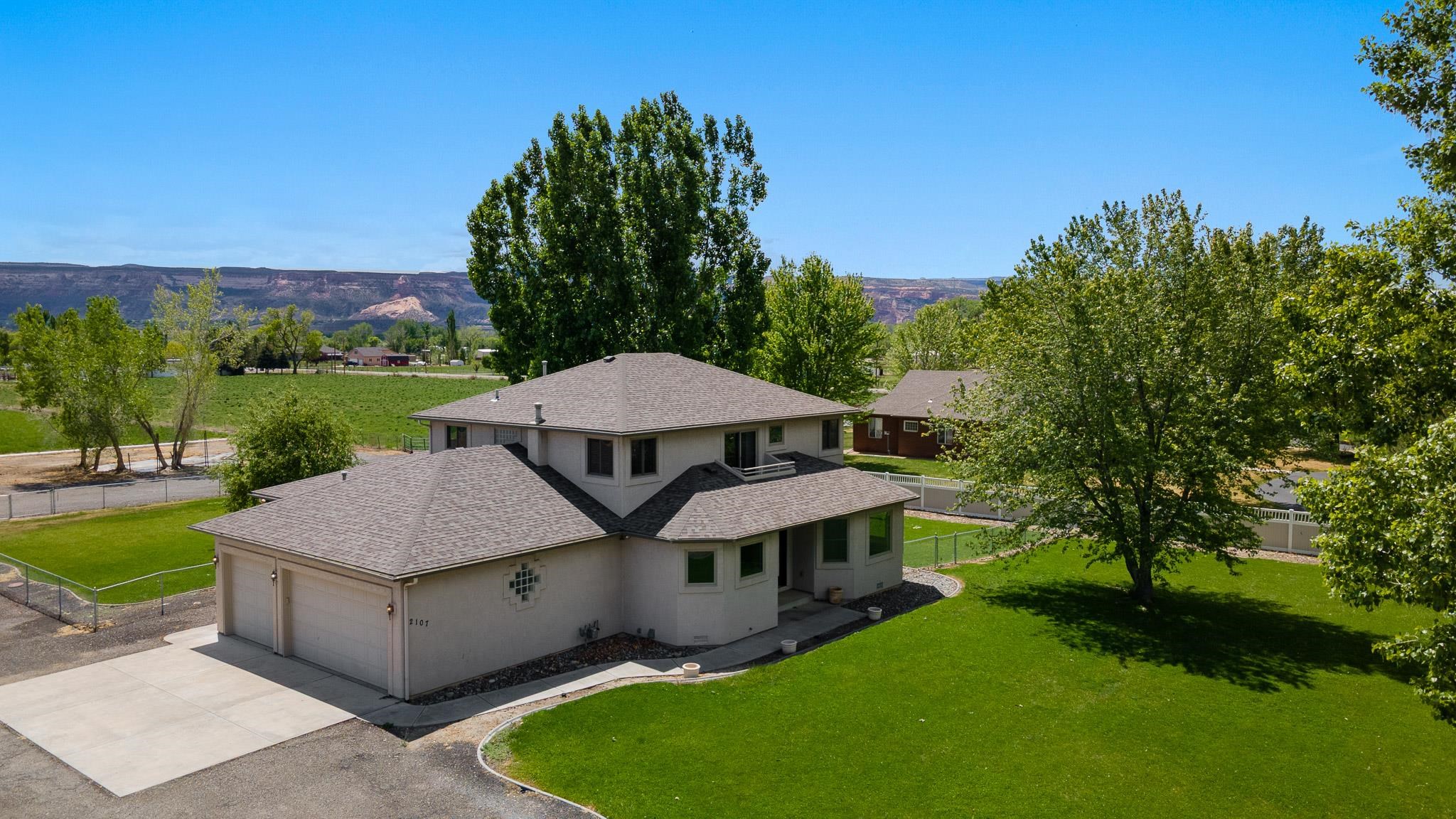 2107 I I- 1/2 Road Grand Junction, CO 81505 - Photo 42 of 42 a view of a house with a yard and sitting area