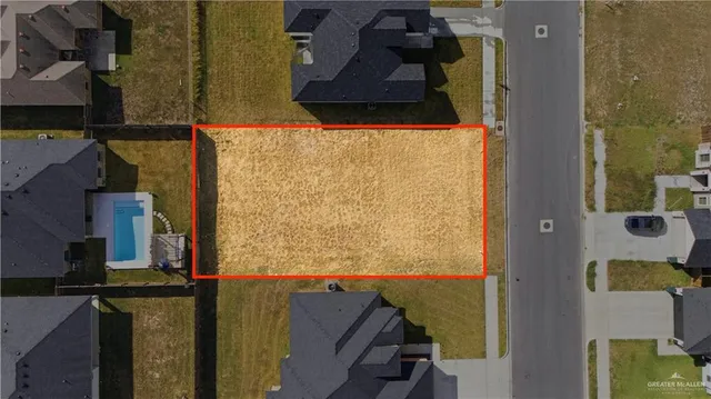 an aerial view of residential house with outdoor space
