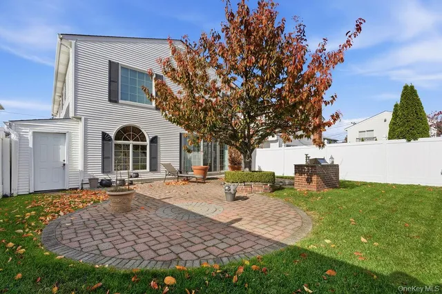 a row of house with outdoor space and sitting area