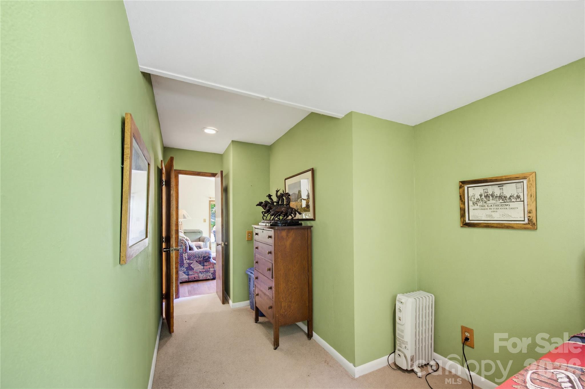 223 Little Cove Road Sylva, NC 28779 - Photo 17 of 31 a view of a hallway with workspace
