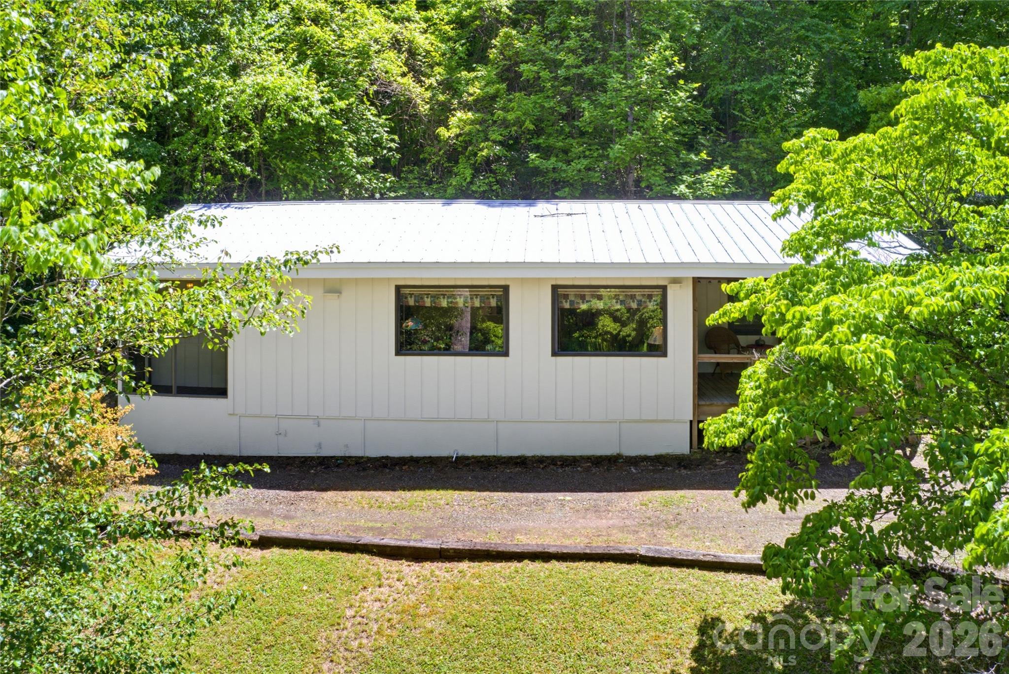 223 Little Cove Road Sylva, NC 28779 - Photo 3 of 31 a view of a house with a yard