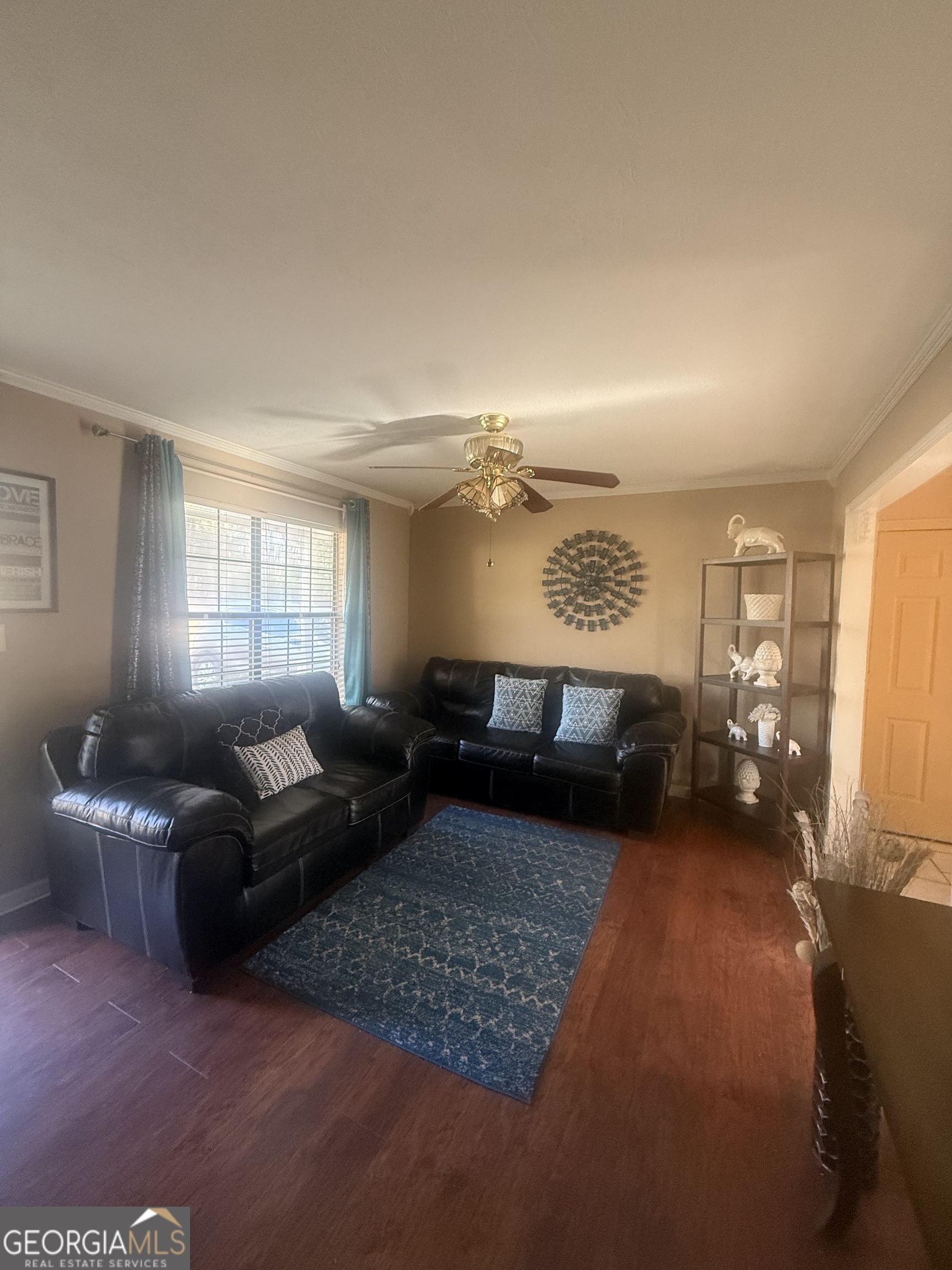 245 West James Circle Hampton, GA 30228 - Photo 3 of 14 a living room with furniture