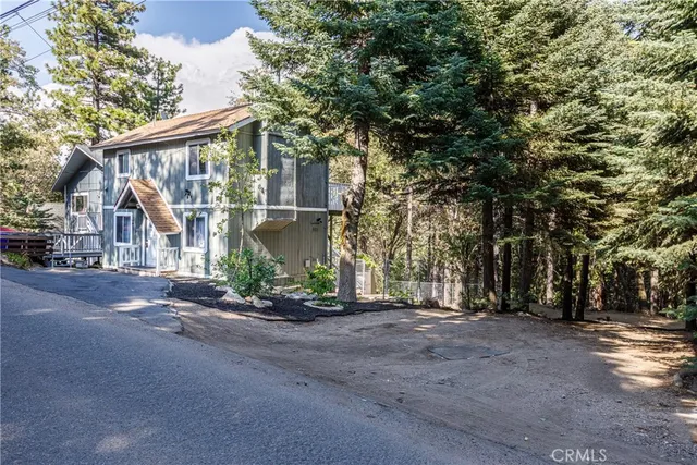 a view of a house with a street