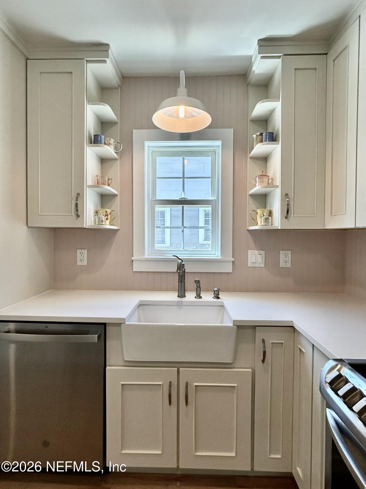 1011 Inwood Terrace Jacksonville, FL 32207 - Photo 11 of 56 a kitchen with a sink cabinets and window