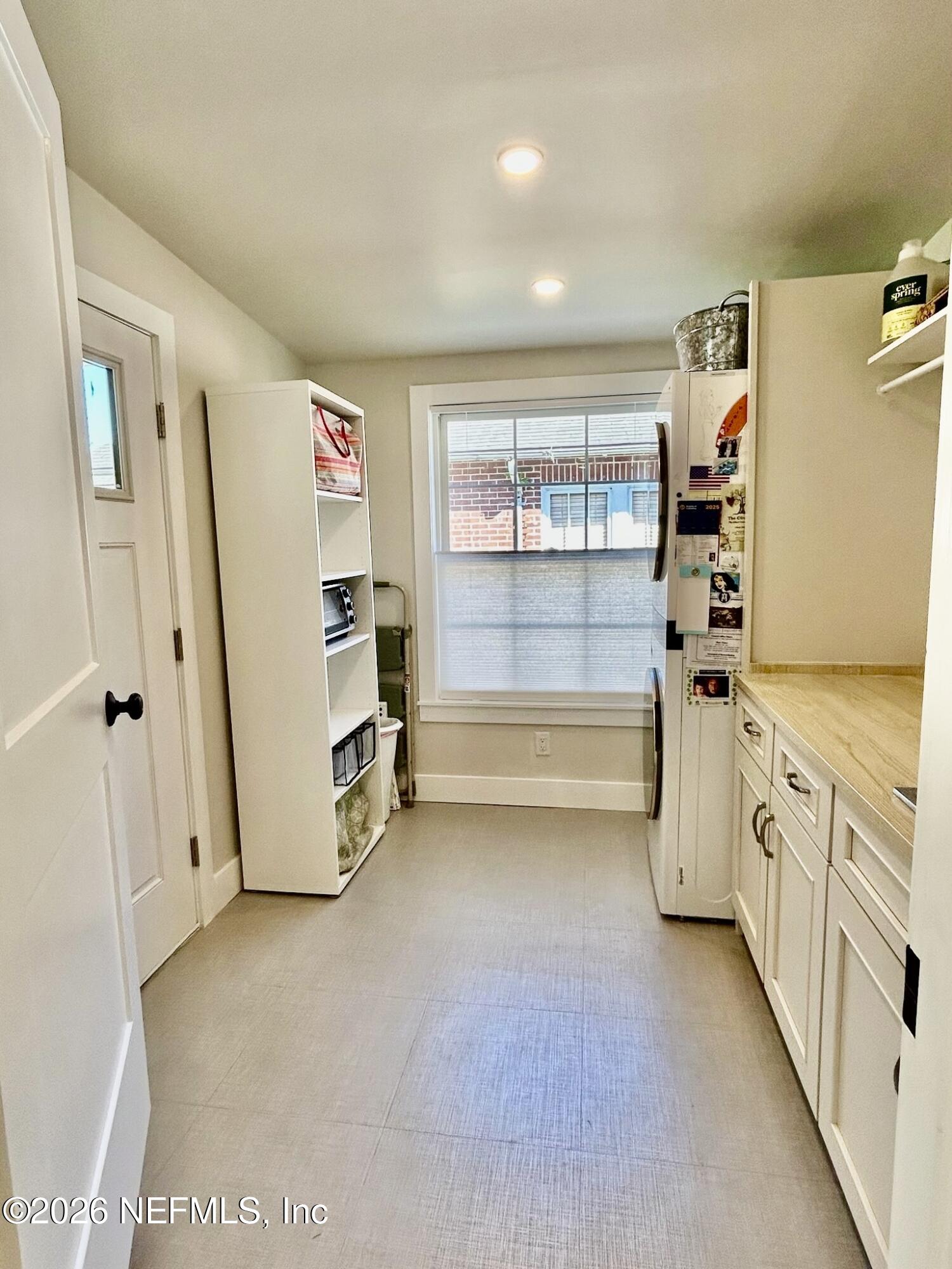 1011 Inwood Terrace Jacksonville, FL 32207 - Photo 27 of 56 a view of walk in closet with clothes and shoes