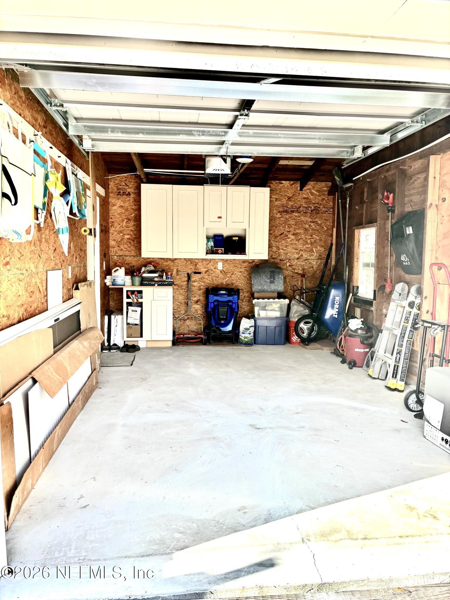 1011 Inwood Terrace Jacksonville, FL 32207 - Photo 39 of 56 a living room with furniture and a flat screen tv