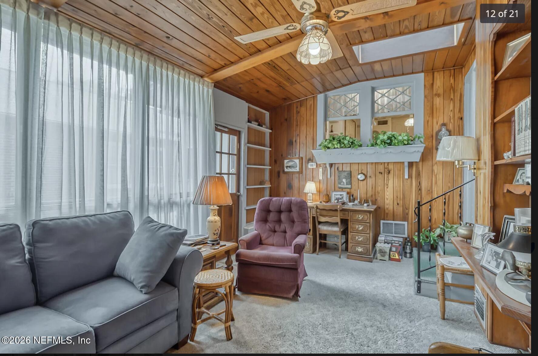 1011 Inwood Terrace Jacksonville, FL 32207 - Photo 48 of 56 a living room with furniture and a large window