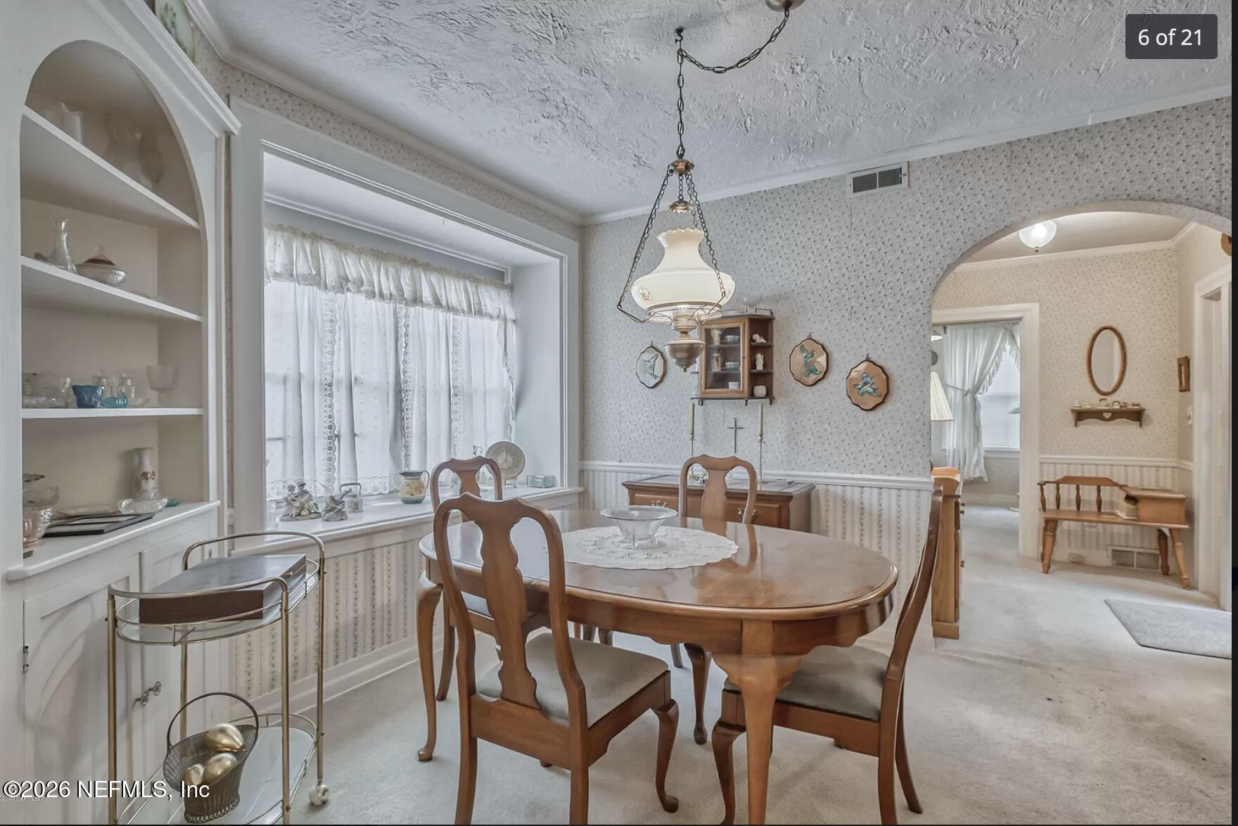 1011 Inwood Terrace Jacksonville, FL 32207 - Photo 50 of 56 a view of a dining room with furniture window and outside view