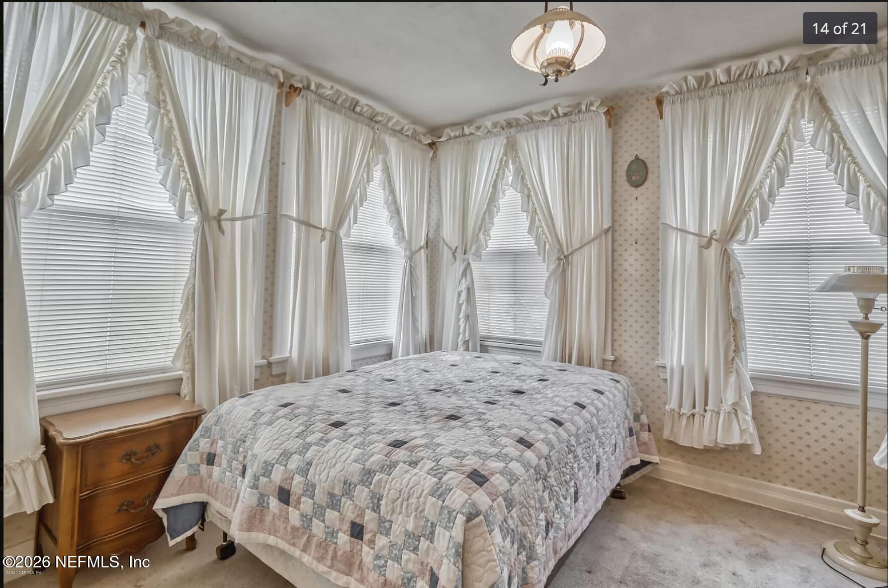 1011 Inwood Terrace Jacksonville, FL 32207 - Photo 55 of 56 a bedroom with a bed and a window