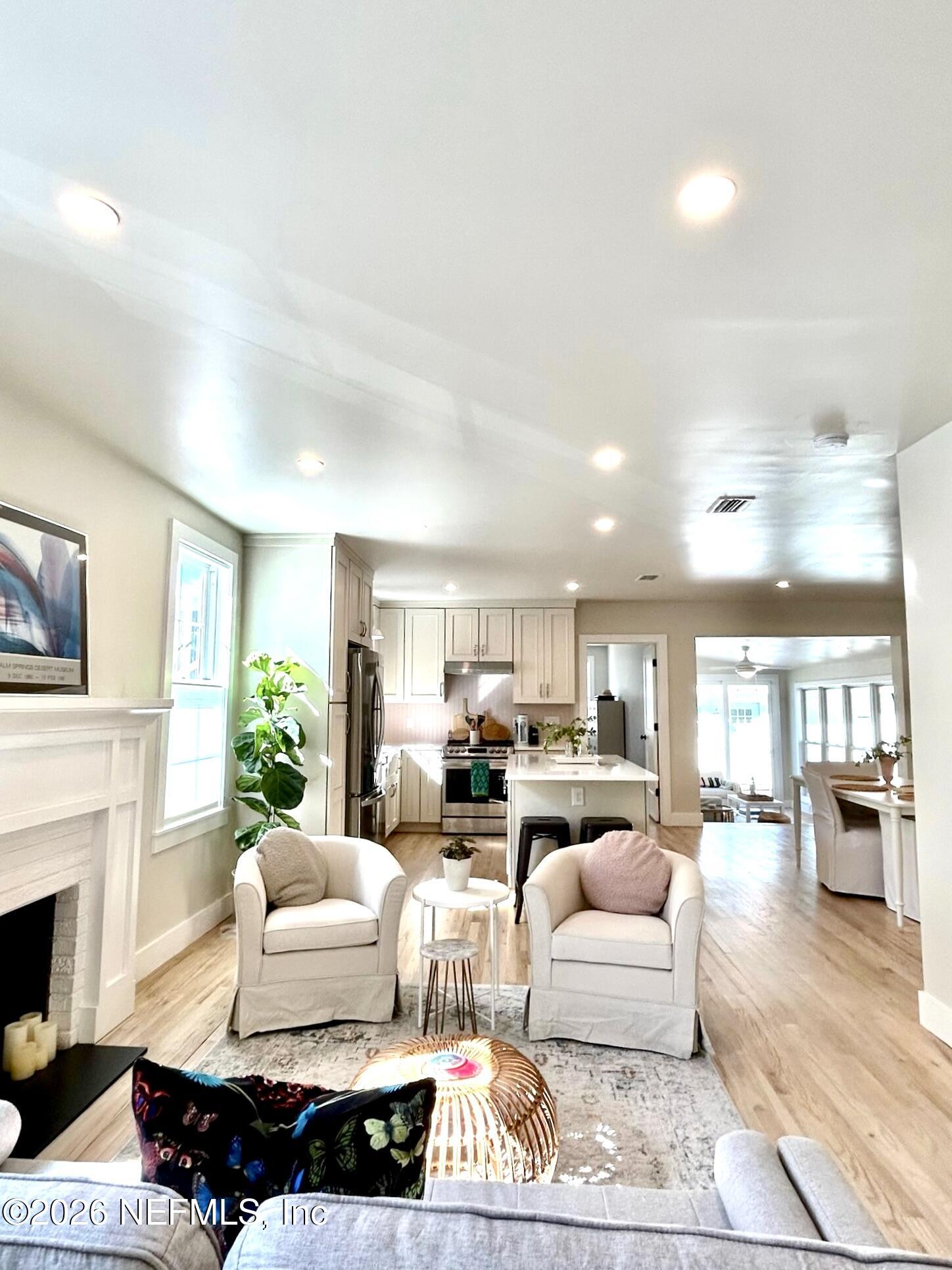 1011 Inwood Terrace Jacksonville, FL 32207 - Photo 8 of 56 a living room with furniture and a fireplace