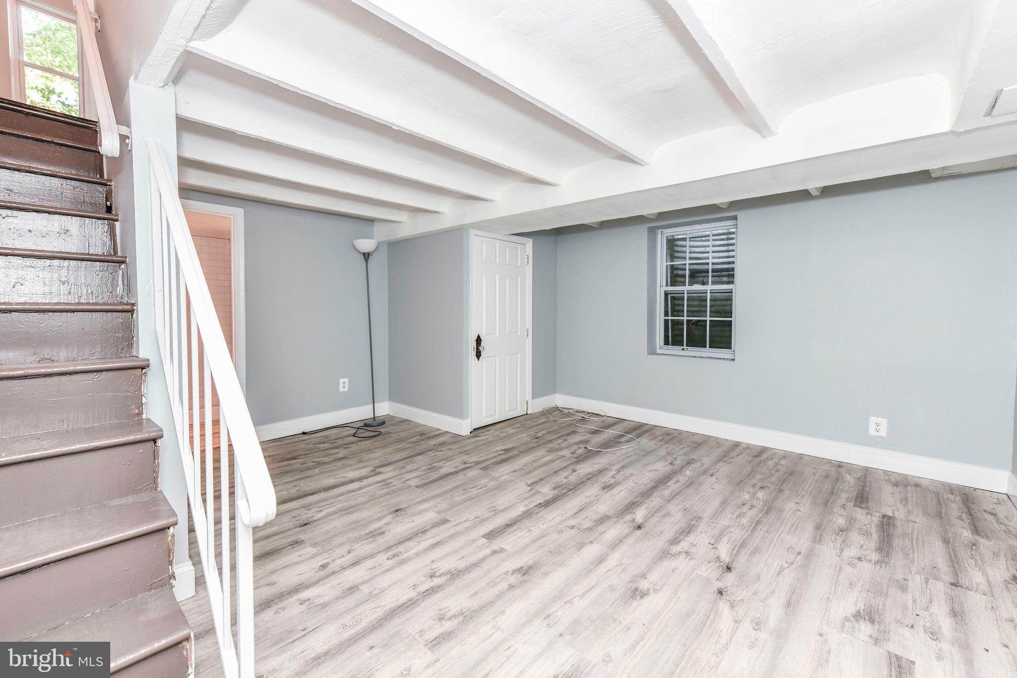 3210 9th Street South Arlington, VA 22204 - Photo 14 of 26 a view of empty room with wooden floor and fan