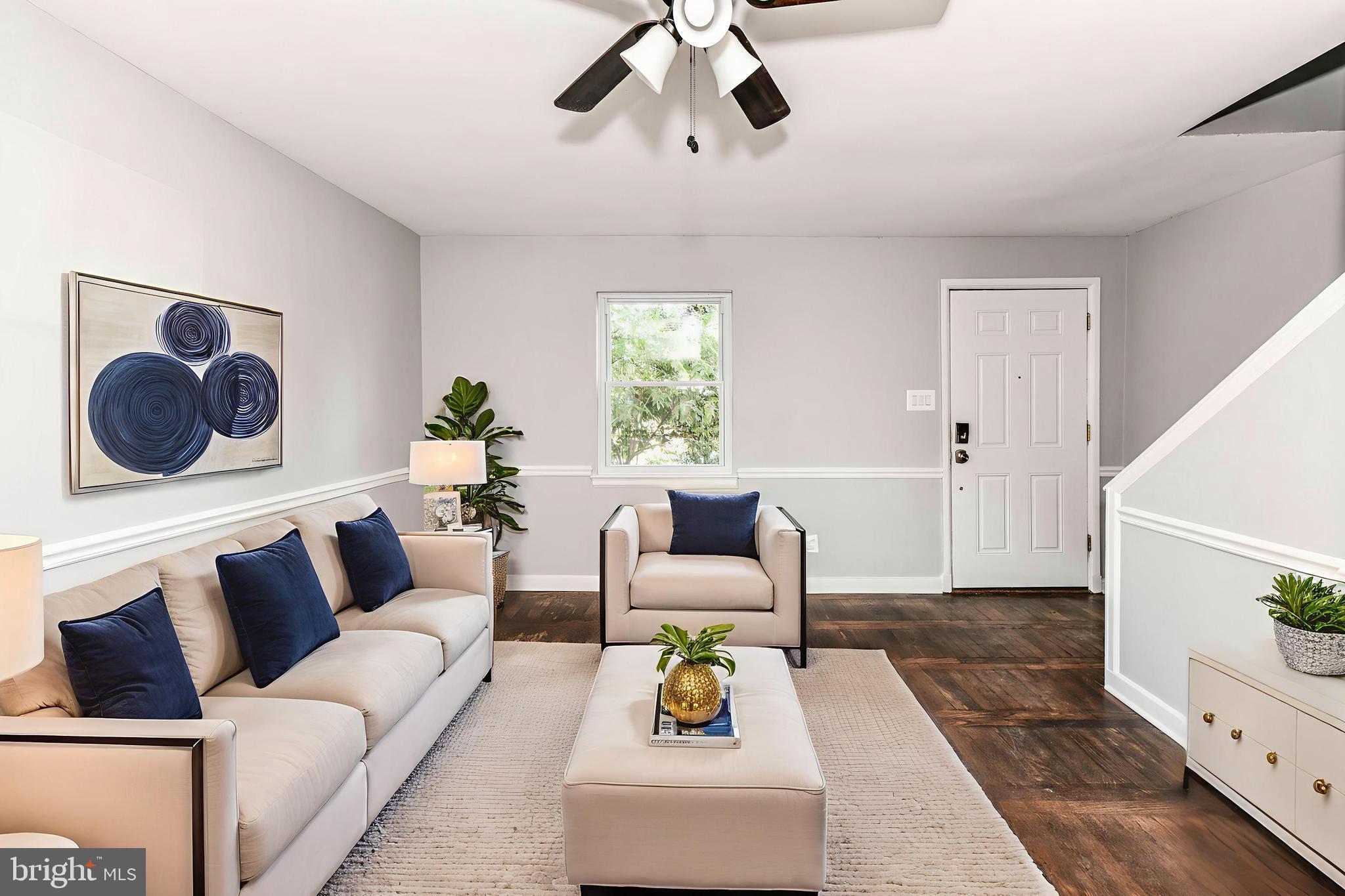 3210 9th Street South Arlington, VA 22204 - Photo 4 of 26 a living room with furniture and a large window