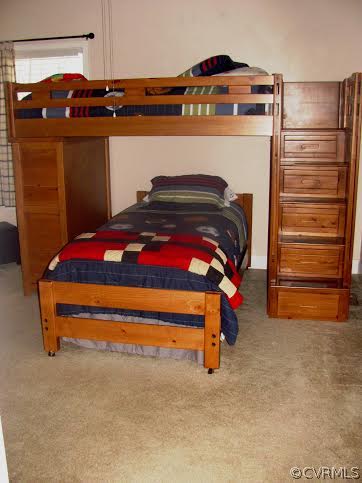 2862 Roundabout Road Louisa, VA 23093 - Photo 22 of 24 a bedroom with a bed and a mirror