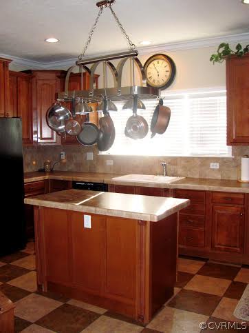 2862 Roundabout Road Louisa, VA 23093 - Photo 23 of 24 a kitchen with a sink and a stove