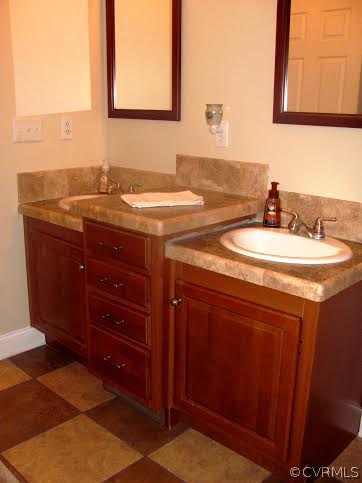 2862 Roundabout Road Louisa, VA 23093 - Photo 6 of 24 a bathroom with a sink and a mirror