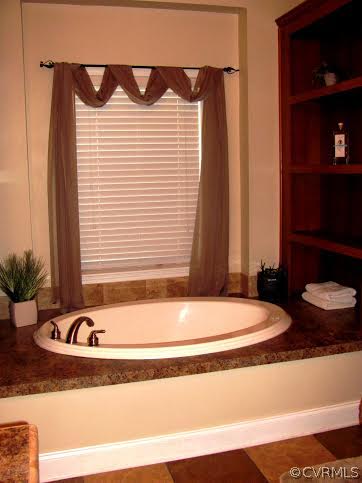 2862 Roundabout Road Louisa, VA 23093 - Photo 7 of 24 a bathroom with a bathtub and shower
