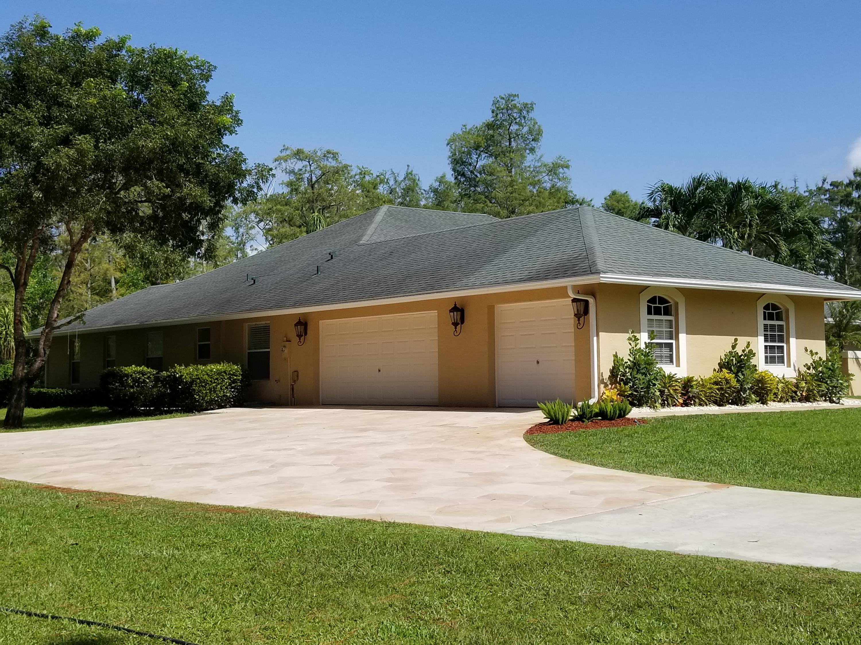 6037 Reynolds Road Lake Worth, FL 33449 - Photo 3 of 44 OVERSIZED GARAGE