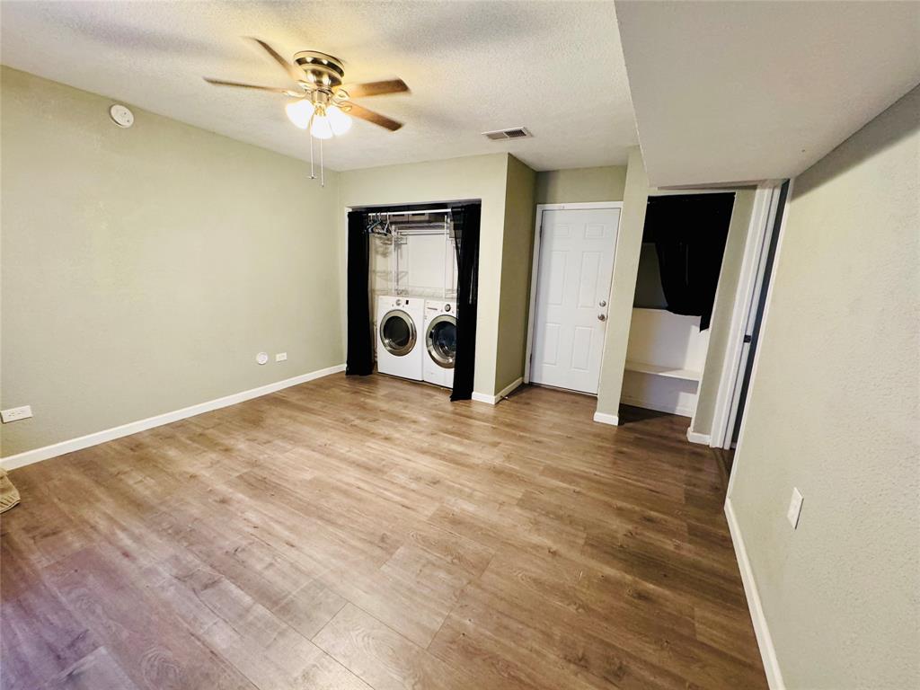 1712 Smokehouse Road Granbury, TX 76049 - Photo 11 of 25 Spacious laundry room with endless possibilites