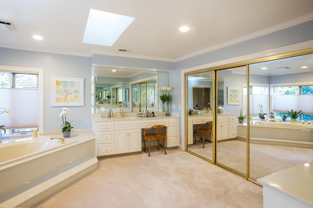 1003 Rodeo Road Pebble Beach, CA 93953 - Photo 11 of 24 a bathroom with a tub and a sink