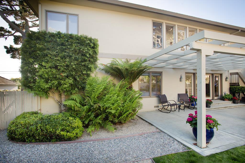 1003 Rodeo Road Pebble Beach, CA 93953 - Photo 21 of 24 a view of a potted plants in front of a house