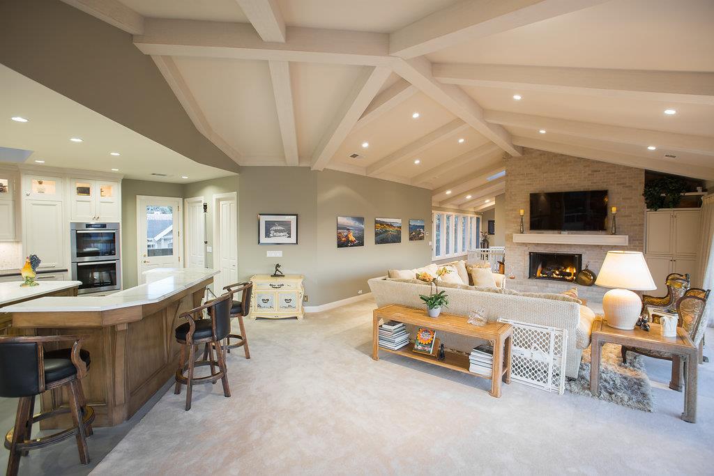 1003 Rodeo Road Pebble Beach, CA 93953 - Photo 4 of 24 a living room with furniture and a flat screen tv